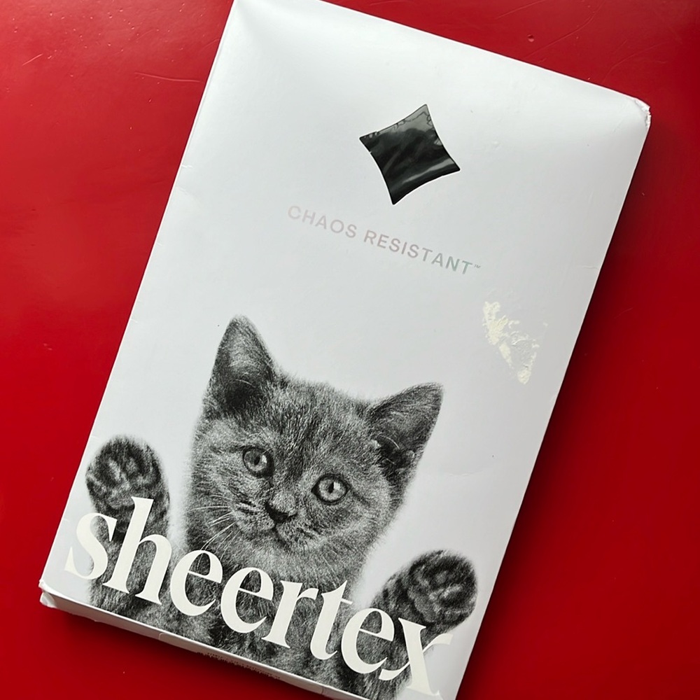 Sheertex sheer black tights with hearts